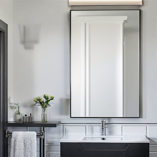 Upgrade your bathroom or entryway with our stylish brushed black metal framed mirror. It's the perfect addition to elevate your space. Click now for more!