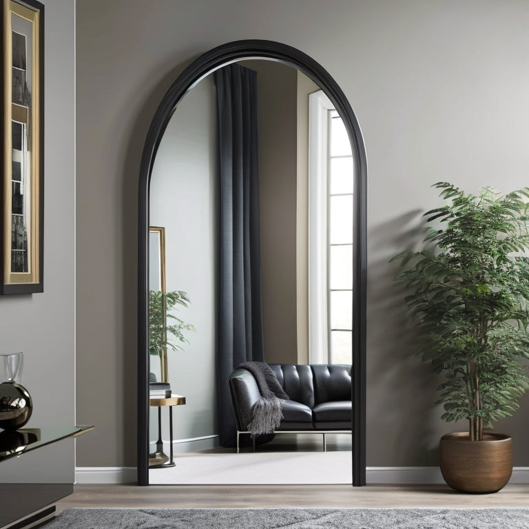 Discover the perfect finishing touch for your home decor with our stylish arched wall mirror. Its sleek black metal frame adds a modern touch to any space.