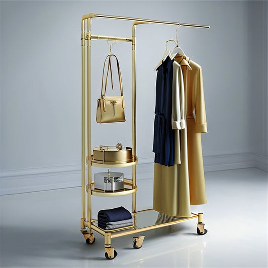 Discover the perfect blend of style and functionality with our gold clothing rack. With wheels and a 2-tier shelf, it's a stylish solution for all your storage needs.